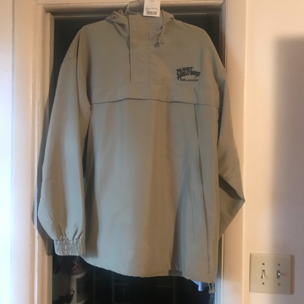 Brand new light weight rain jacket/wind breaker